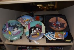 A collection of 1990s Warner Bro.s collector's plates, including 'Bedevilled Rabbit' and 'Room and