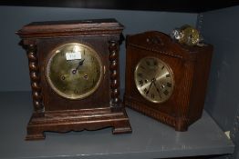 Two early 20th Century oak cased mantel clocks, to include a Junghans clock with two train