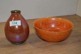A Royal Lancastrian footed bowl, glazed in orange, diameter 15cm, and a Pilkington's Royal