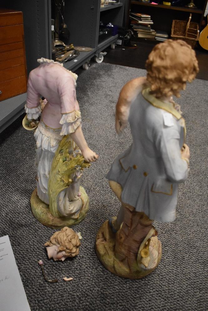 Two 19th century German bisque porcelain figures, depicting man with fox and woman(AF). - Image 7 of 8
