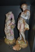 Two 19th century German bisque porcelain figures, depicting man with fox and woman(AF).