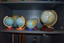A group of mid-20th Century tinplate desk globes, by Chad Valley, and other manufacturers, the