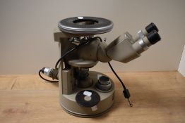 A vintage electronic scientific microscope.