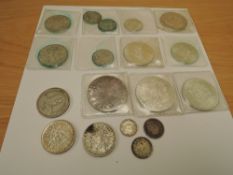 A collection of World Silver Coins, Mexico 1968 25 Pesos Coin, Canada 1964 Dollar, Austrian