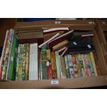 A carton of mainly childrens books including six Enid Blyton titles, a boxed set of The Wind in