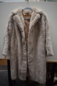 A vintage faux fur coat.