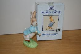 A Beswick Beatrix Potter 100 Year Anniversary Peter Rabbit ornament, with box