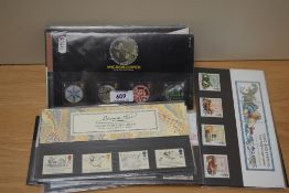 A selection of collectable Royal Mint stamp sets, including sport and transport interest.