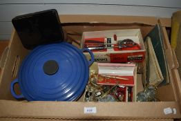 A miscellaneous selection of items including a large blue Le Creuset casserole dish, a vintage boxed