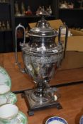 A Victorian silver plated samovar, having handles to sides and etched design.