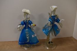Two mid century Venetian glass figurines in blue and latticino with aventurine inclusions, depicting