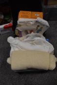 A mixed lot of vintage items, to include baby clothes, dress making patterns, Lace collar etc.