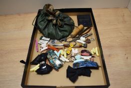 A miscellany of items, to include; antique needle cases, vintage hair clips and curios.