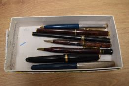 A small collection of writing instruments