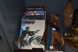 A selection of books, including two vintage bibles and a mixed lot of comic books including Star