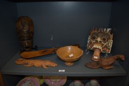 A selection of treen, including African mask, carved and panited oriental dragon mask, turned bowl