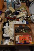 An array of vintage haberdashery to include a large amount of buttons, Art Deco buckles and some