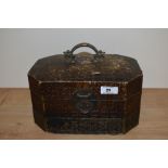 A vintage style jewellery case with brass handle and catch.