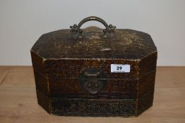 A vintage style jewellery case with brass handle and catch.