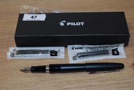 A boxed Pilot fountain pen with spare cartridges