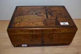An early to mid 20th century walnut jewellery box, having inlaid canal and tow path scene, with