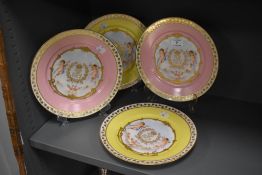 Four French Sevres circa 1870s plates, two having gold and pink borders, and two with gold and
