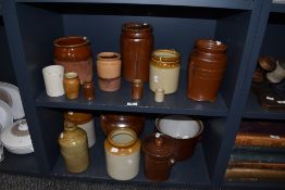 A selection of earthenware jars, some named