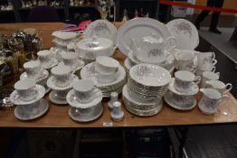 A large collection of Royal Stafford dinner service, having delicate lilac floral design and gilt