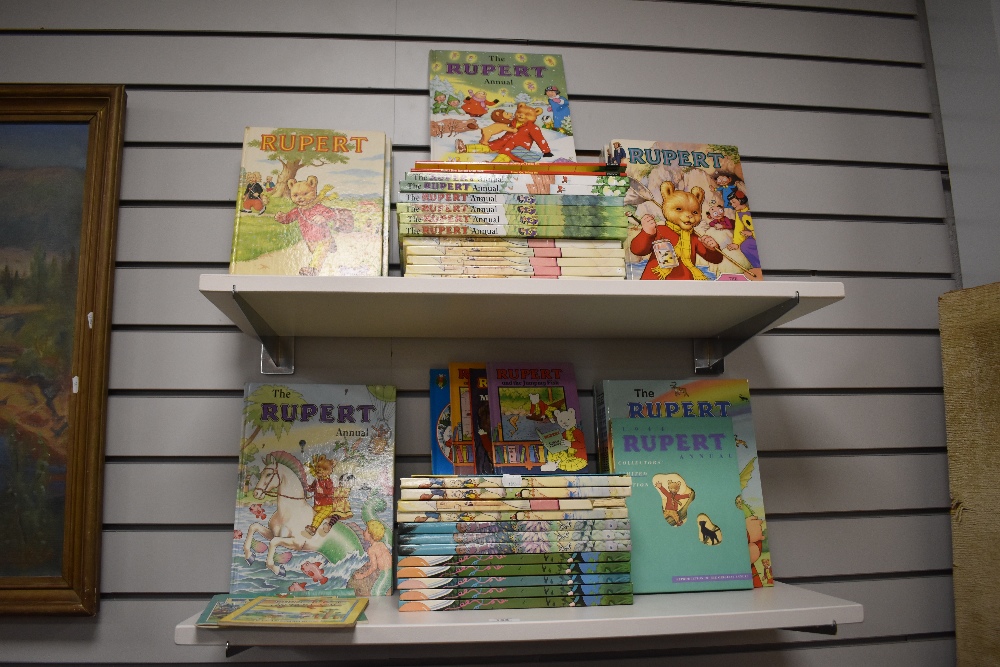 A large lot of Rupert Bear books and annuals.