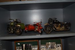 A small collection of metal model motorbikes