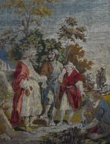 A 19th Century needlework embroidery, depicting a biblical scene with Christ, displayed within a
