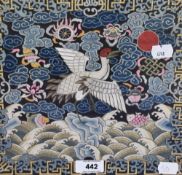A Chinese Mandarin square or rank badge, the Manchu Empire labelled verso, depicting a heron above