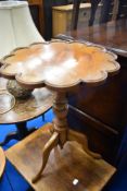 A reproduction 'flower top' yew wood occasional table