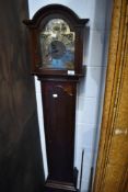 An early to mid 20th Century shortcase 'Grandmother clock) having brass dial