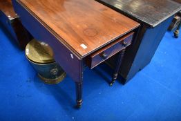 A Regency mahogany Pembroke table in the Gillows style having reeded legs