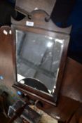 A reproduction 19th Century style stained frame wall mirror
