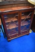A reproduction Regency mahogany low bookcase or display cabinet