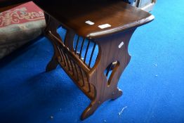 An Ercol mid/dark stained magazine table