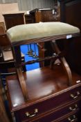 A reproduction Savanorola type stool having dralon seat