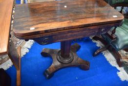 A William IV rosewood fold over card table on typical platform base