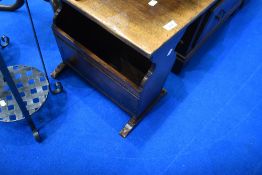A nice quality oak magazine table, possibly Titchmarsh and Goodwin