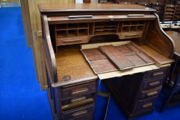 An early 2th Century oak roll top desk, escutcheon stamped Entirely HLL, English Make