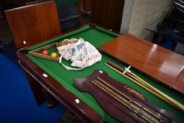 A snooker/dining table having mahogany frame with slate bed, accesories including Riley score board,