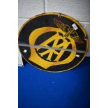 A vintage enamelled sign, diameter approx. 46cm, some chips to edge and paint stripe through