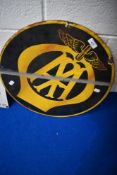 A vintage enamelled sign, diameter approx. 46cm, some chips to edge and paint stripe through