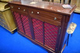 A handmade mahogany sideboard in the Regency style, having musical instrument inlay and brass