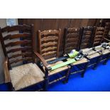 A set of six (four plus two ) traditonal rush seated ladderback chairs