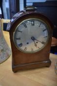 An Edwardian mahogany bracket clock having silvered Roman numeral dial, movement stamped , W & H,