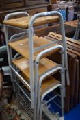 A set of four vintage lab/school stools