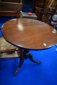 A 19th Century mahogany pedestal table having circular top, turned column and triple splay legs,